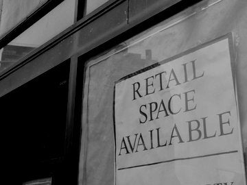 Storefront with a sign that says Retail Space Available